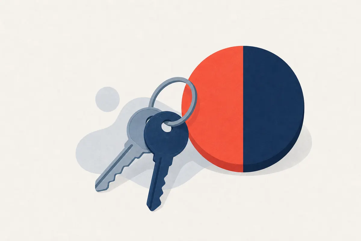Deux clés de maison et un graphique partagé en deux